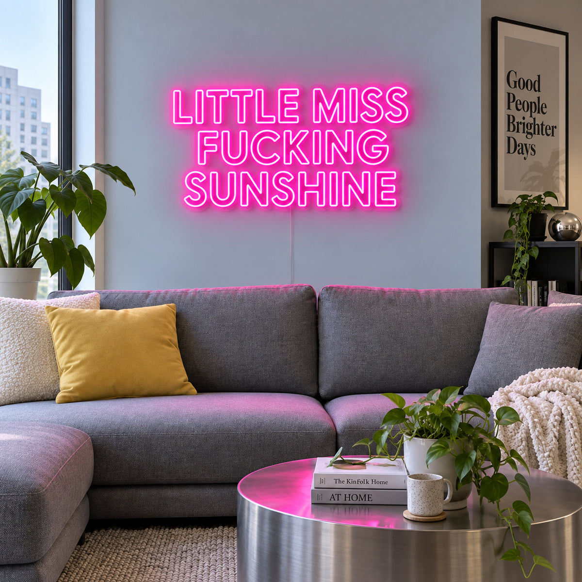 Rose Red version of the Little Miss Fucking Sunshine Neon Sign, shown above a grey sofa with yellow cushions.