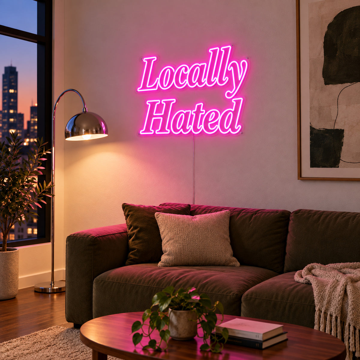Rose Red version of the Locally Hated Neon Sign, shown above a green sofa.