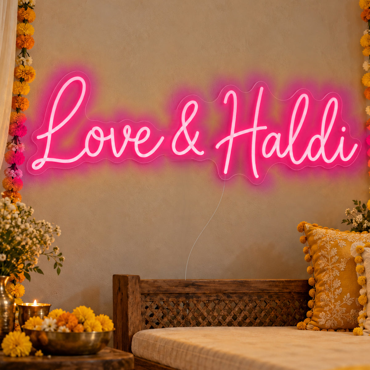 Love Haldi Neon Sign in rose red LED neon on clear acrylic, angled view