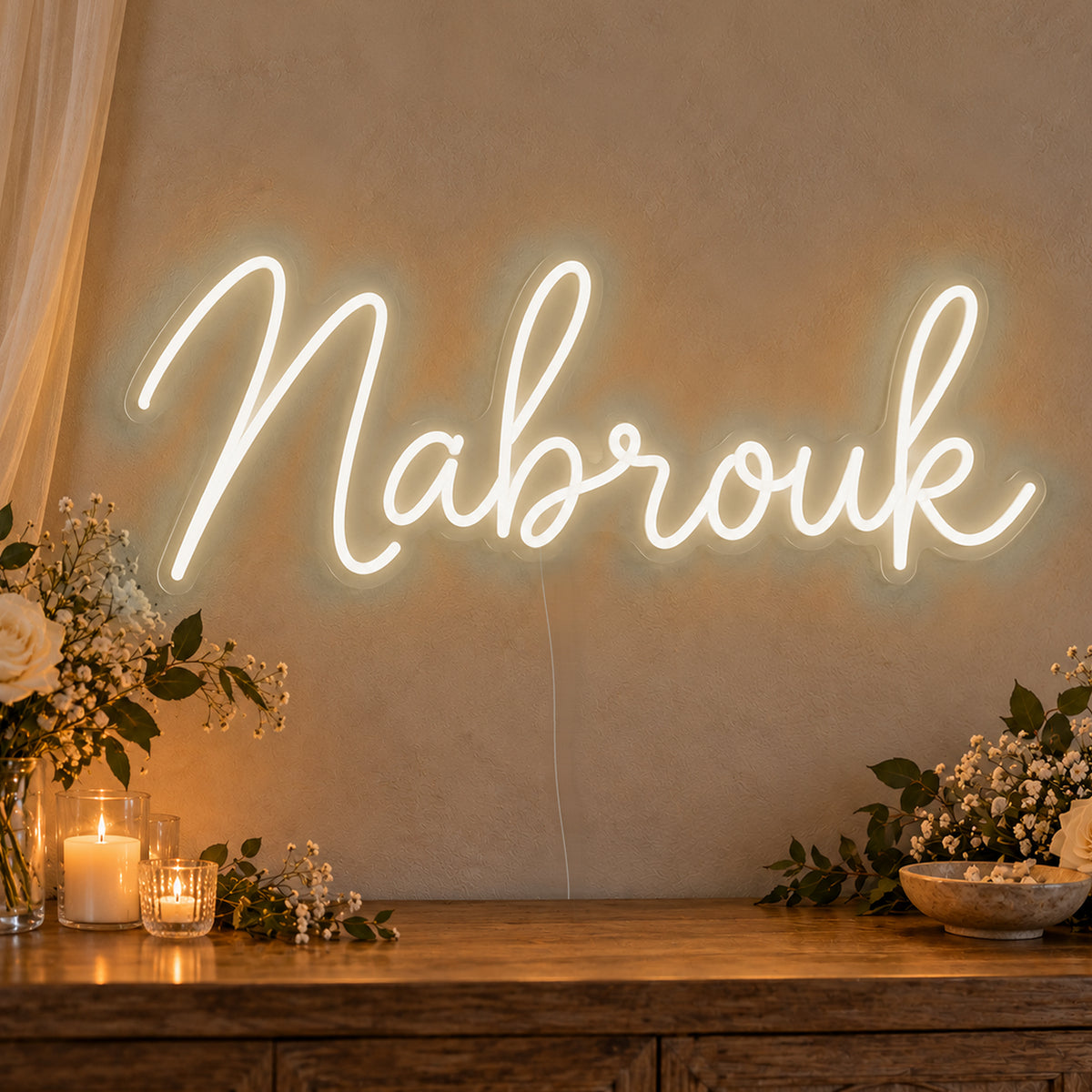 Mabrouk Neon Sign in warm white LED neon on clear acrylic, angled view