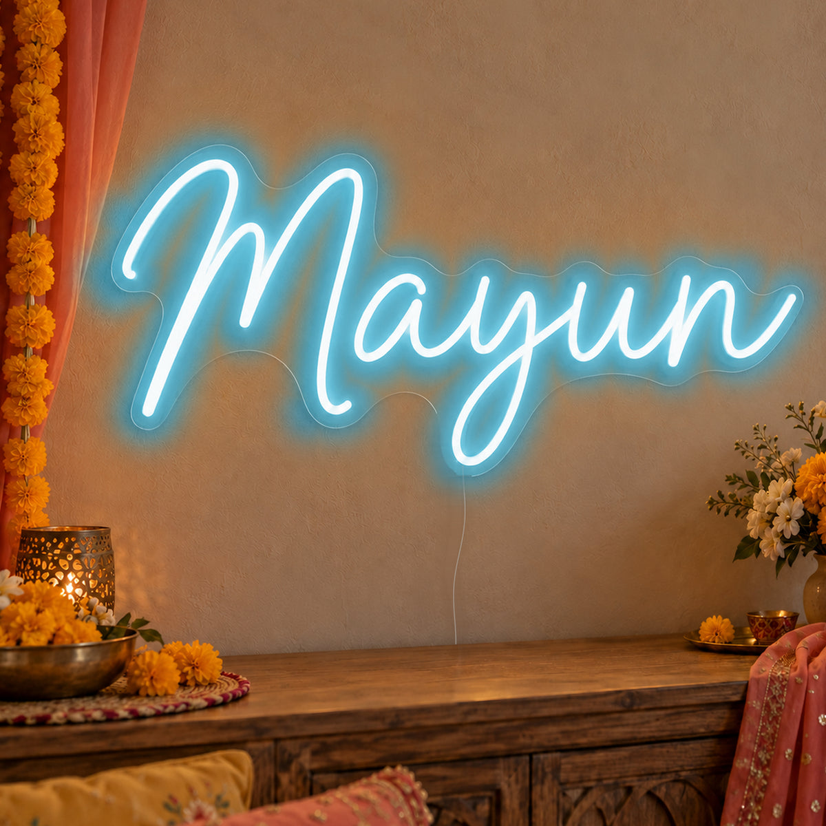 Mayun Neon Sign in ice blue LED neon on clear acrylic, angled view
