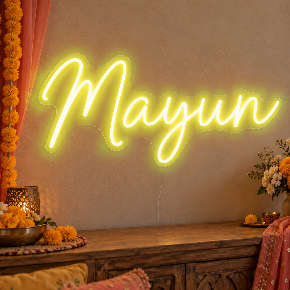 Mayun Neon Sign in yellow LED neon on clear acrylic, angled view