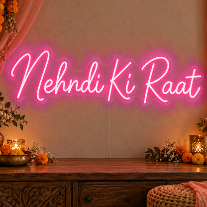 Mehndi Ki Raat Neon Sign in rose red LED neon on clear acrylic, angled view