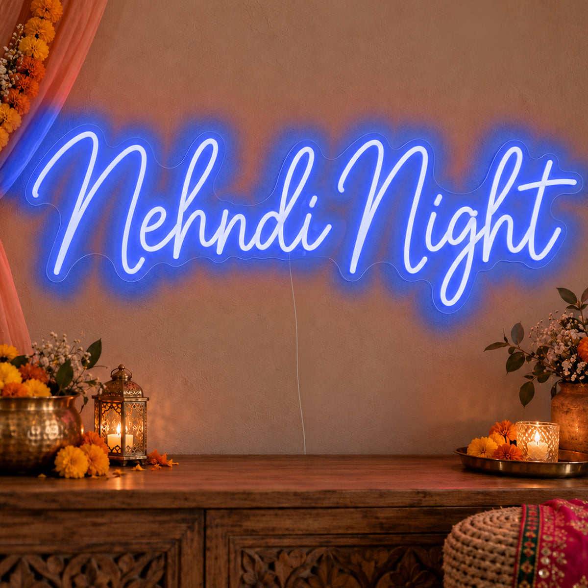 Mehndi Night Neon Sign in blue LED neon on clear acrylic, angled view