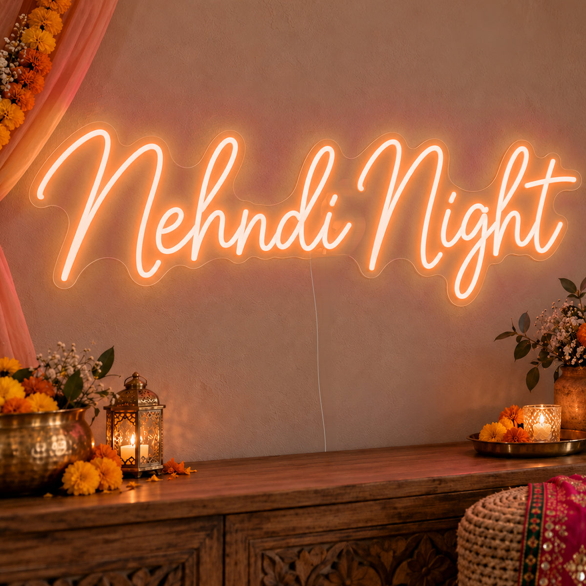 Mehndi Night Neon Sign in orange LED neon on clear acrylic, angled view