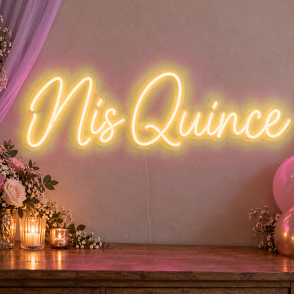 Mis Quince Neon Sign in gold LED neon on clear acrylic, angled view