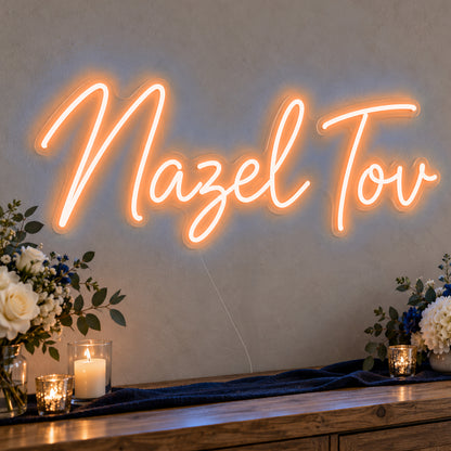 Mazel Tov Blue Neon Sign in orange LED neon on clear acrylic, angled view