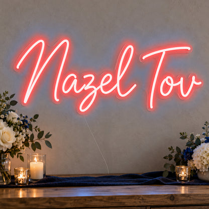 Mazel Tov Blue Neon Sign in red LED neon on clear acrylic, angled view