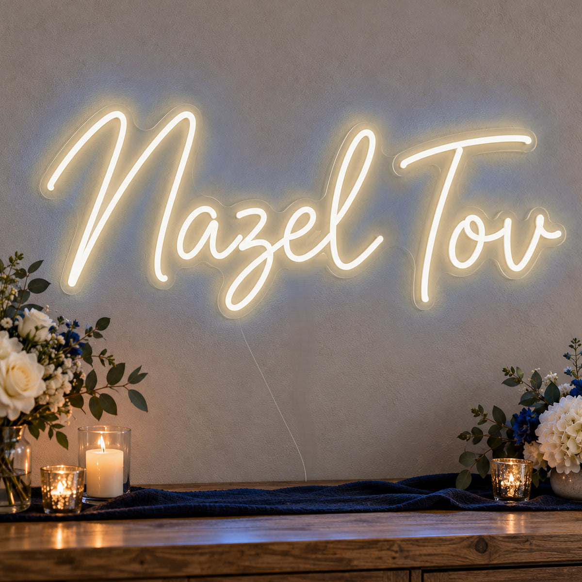 Mazel Tov Blue Neon Sign in warm white LED neon on clear acrylic, angled view