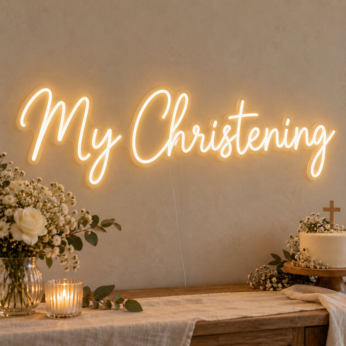 My Christening Neon Sign on clear cut-to-shape acrylic, illuminated on a wall in a styled celebration setting