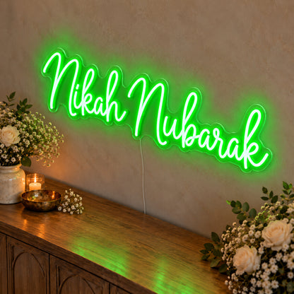 Nikah Mubarak Neon Sign in green LED neon on clear acrylic, angled view