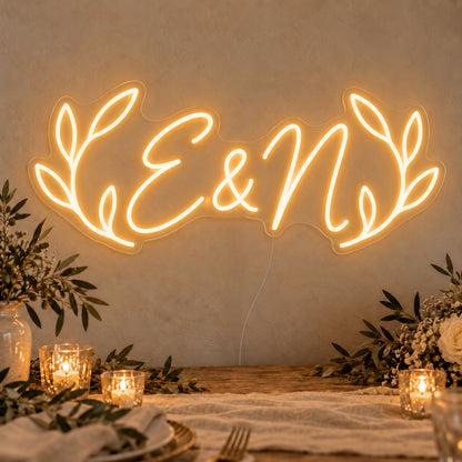 Personalised Olive Initials Neon Sign on clear cut-to-shape acrylic in an illuminated wall display; example personalisation shown.