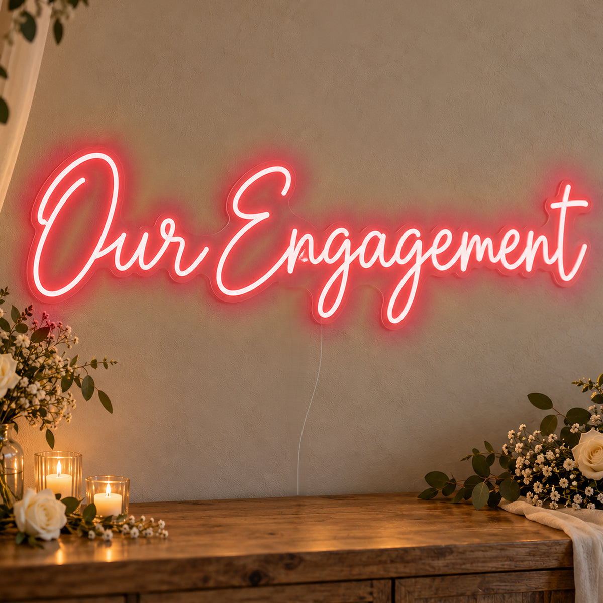 Our Engagement Neon Sign in red LED neon on clear acrylic, angled view