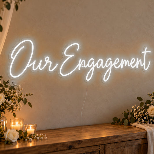Our Engagement Neon Sign in white LED neon on clear acrylic, angled view