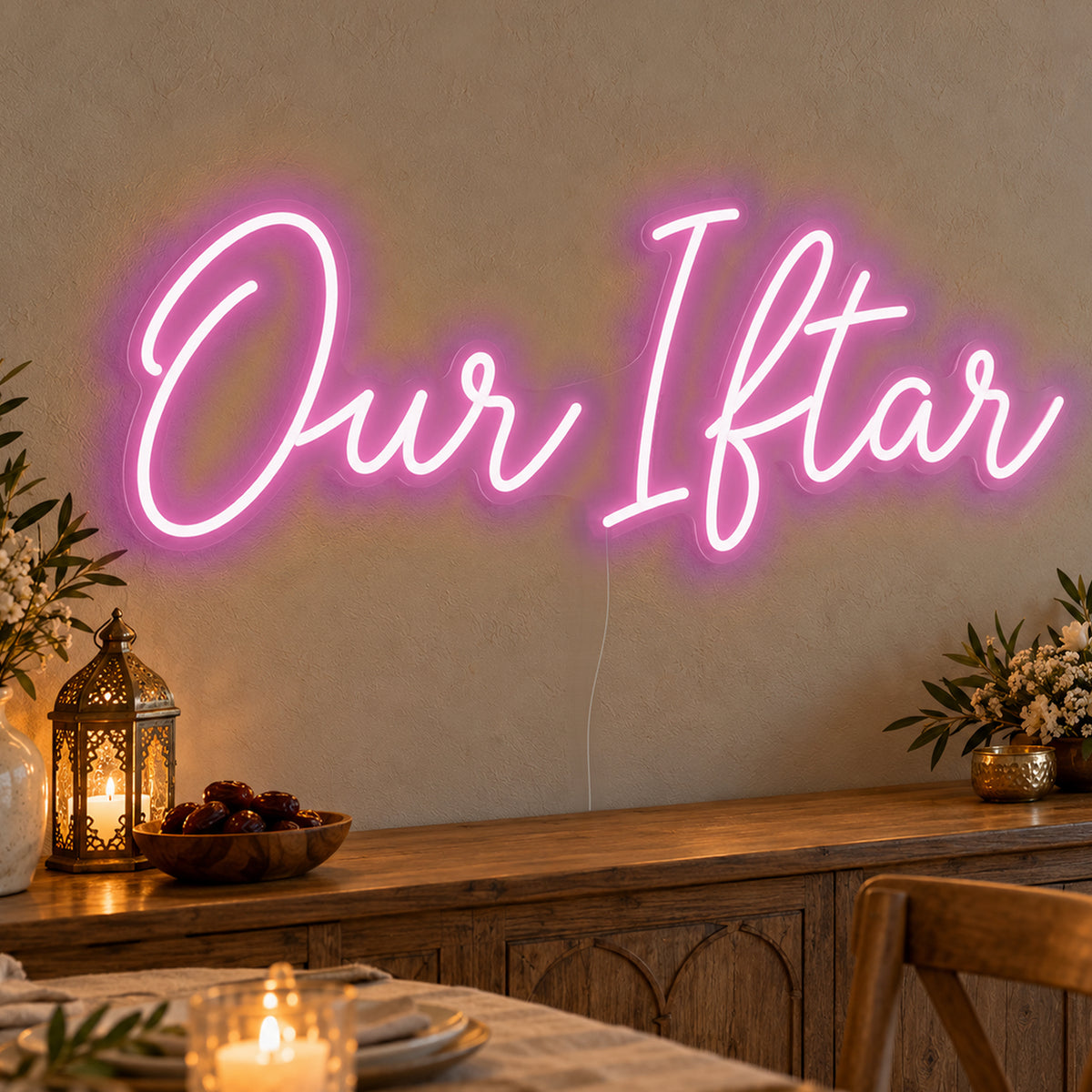 Our Iftar Neon Sign in pink LED neon on clear acrylic, angled view