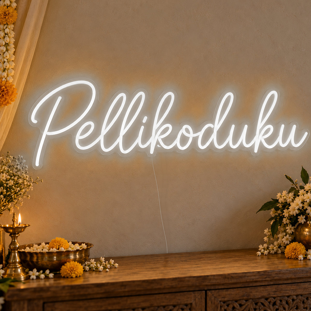 Pellikoduku Neon Sign in white LED neon on clear acrylic, angled view