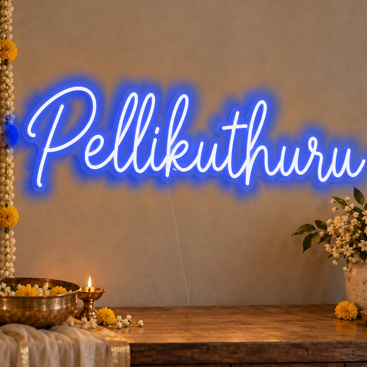 Pellikuthuru Neon Sign in blue LED neon on clear acrylic, angled view