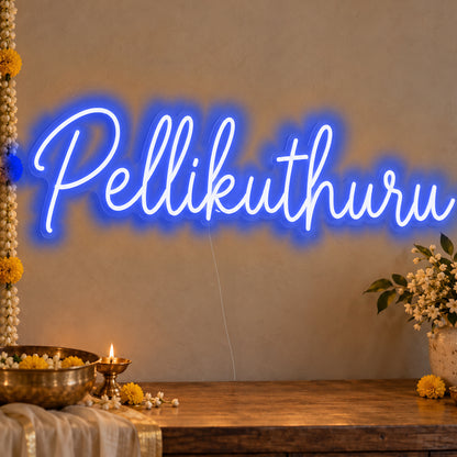 Pellikuthuru Neon Sign in blue LED neon on clear acrylic, angled view