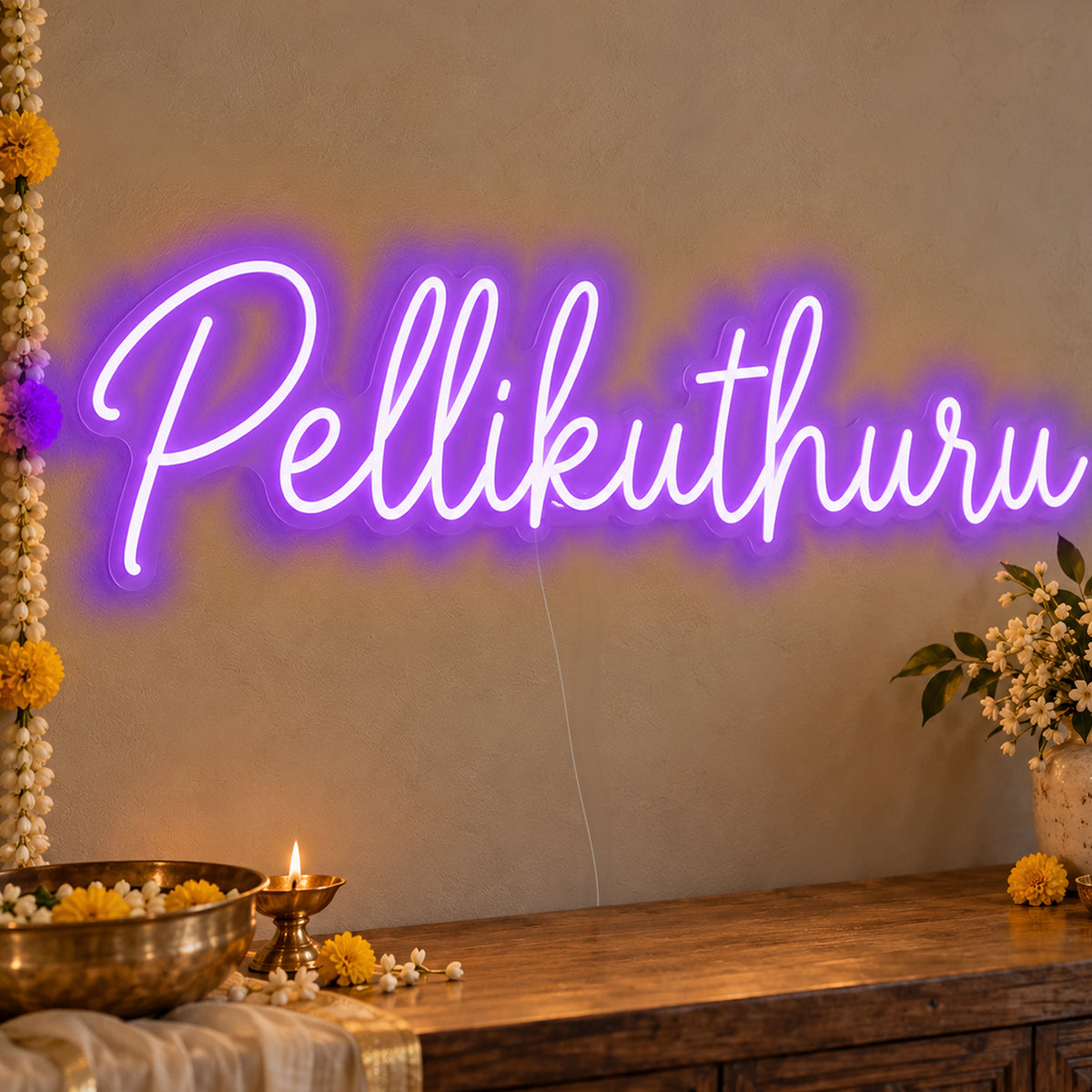 Pellikuthuru Neon Sign in purple LED neon on clear acrylic, angled view