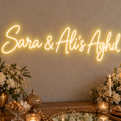Personalised Aghd Neon Sign in gold LED neon on clear acrylic, angled view