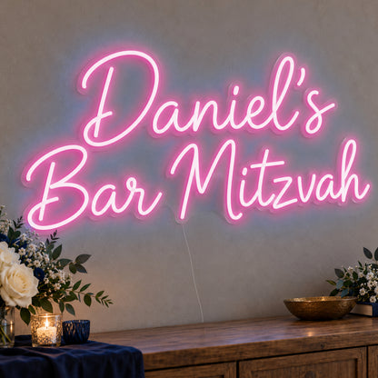 Personalised Bar Mitzvah Neon Sign in pink LED neon on clear acrylic, angled view