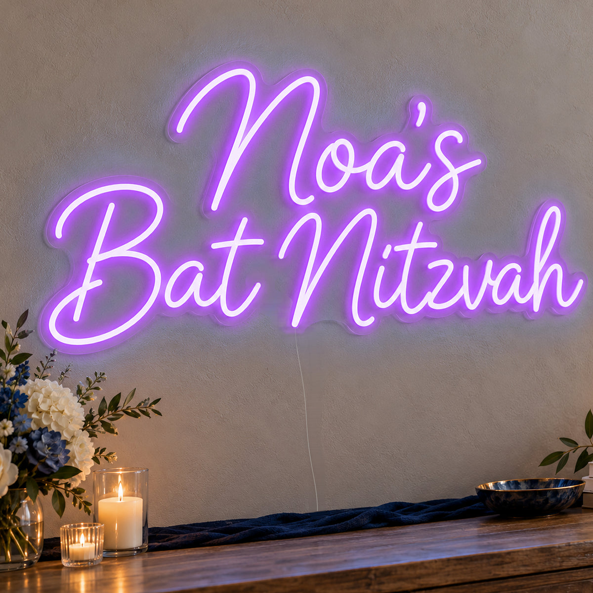 Personalised Bat Mitzvah Neon Sign in purple LED neon on clear acrylic, angled view