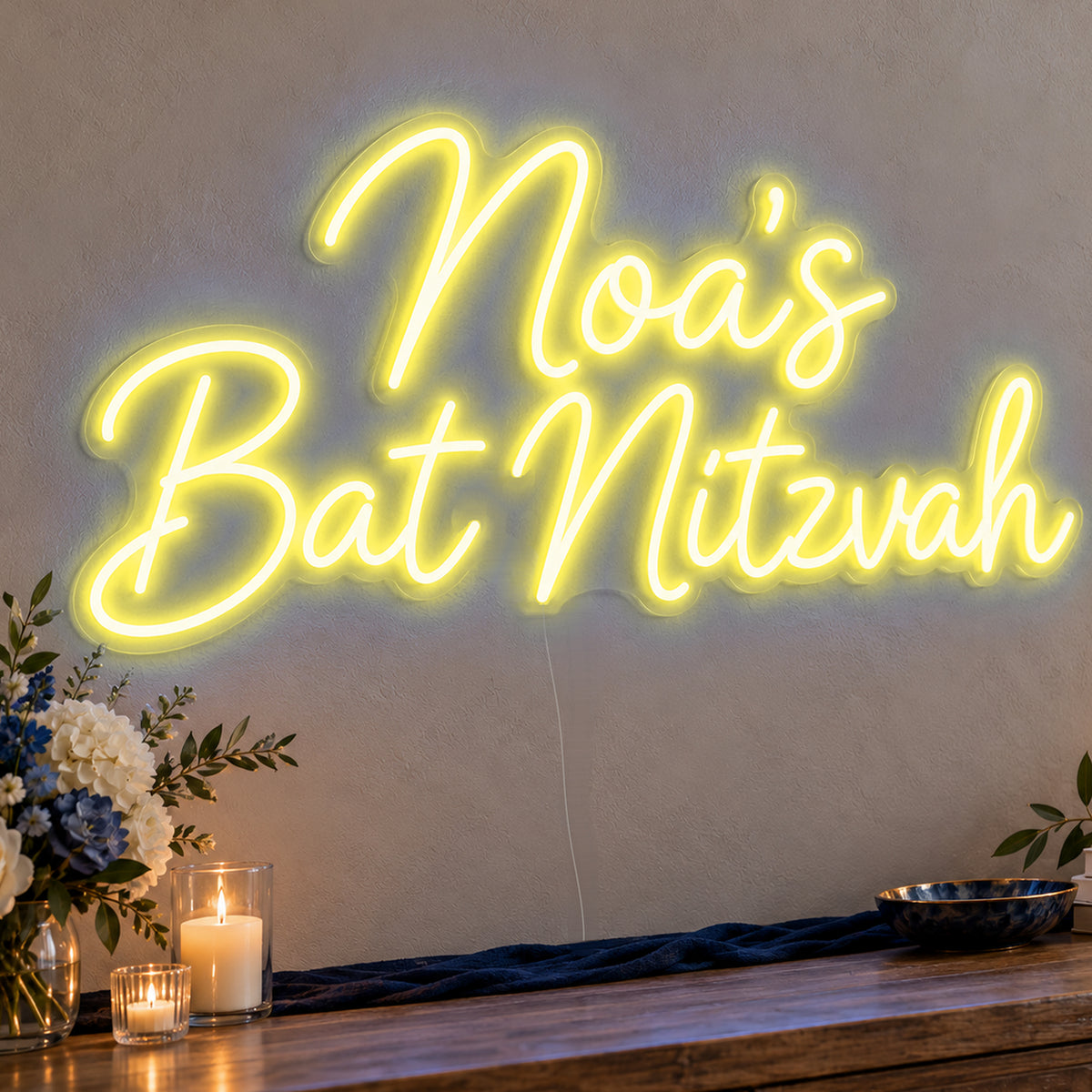 Personalised Bat Mitzvah Neon Sign in yellow LED neon on clear acrylic, angled view