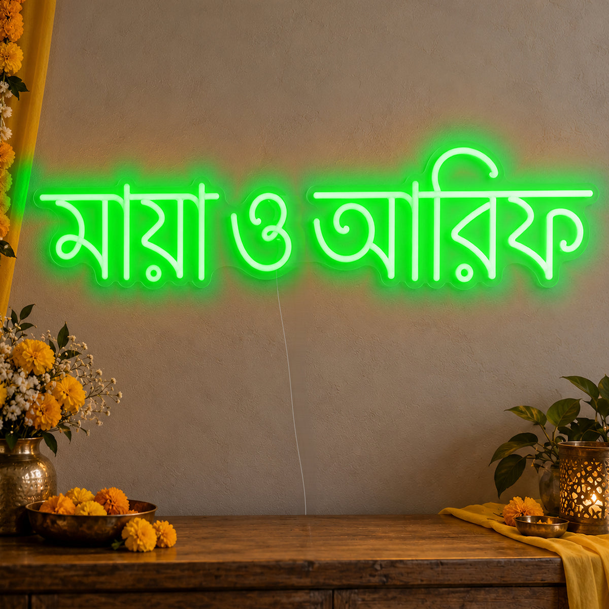 Personalised Bengali Couple Names Neon Sign in green LED neon on clear acrylic, angled view