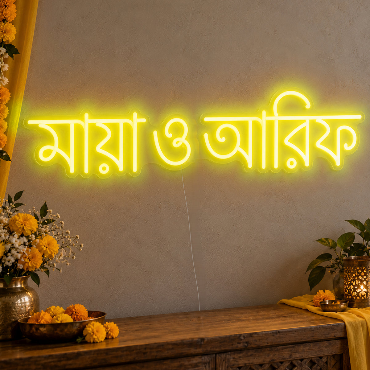 Personalised Bengali Couple Names Neon Sign in yellow LED neon on clear acrylic, angled view