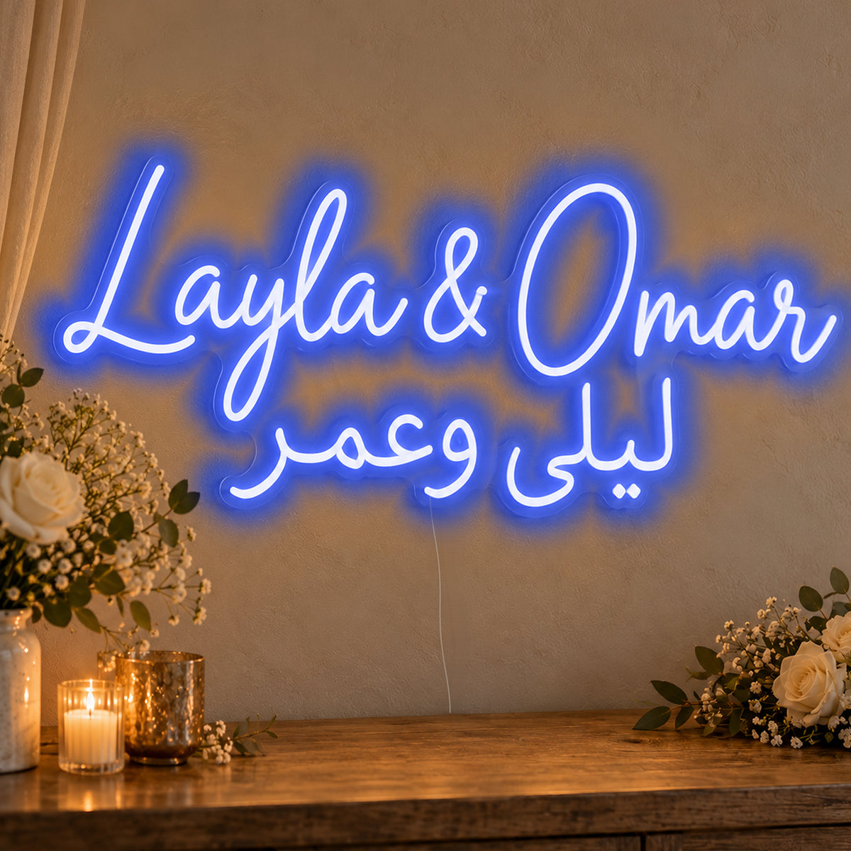Personalised Bilingual Arabic English Names Neon Sign in blue LED neon on clear acrylic, angled view