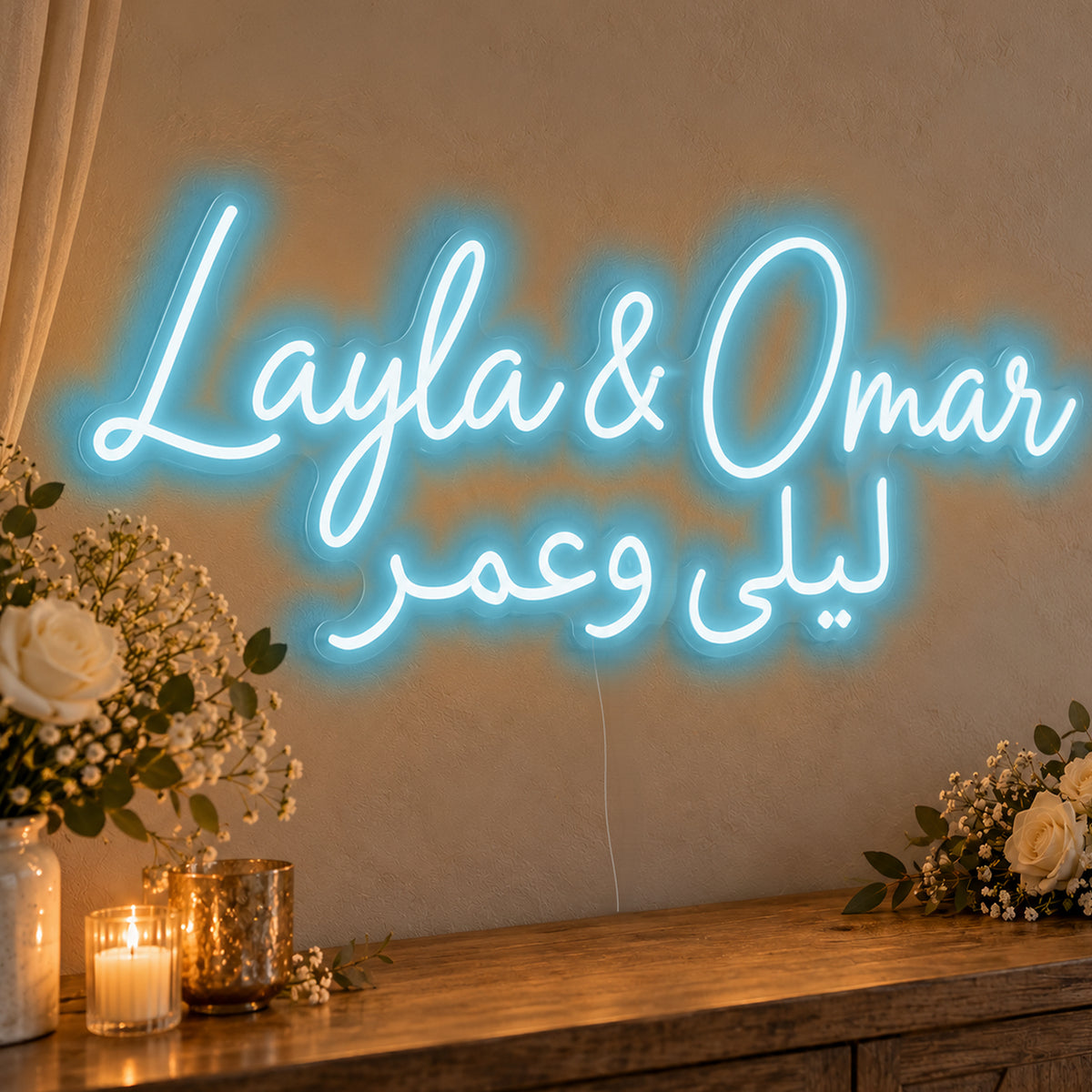 Personalised Bilingual Arabic English Names Neon Sign in ice blue LED neon on clear acrylic, angled view