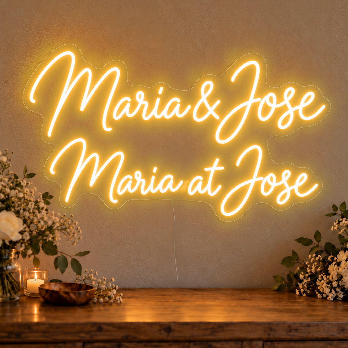 Personalised Bilingual Filipino Names Neon Sign in gold LED neon on clear acrylic, angled view
