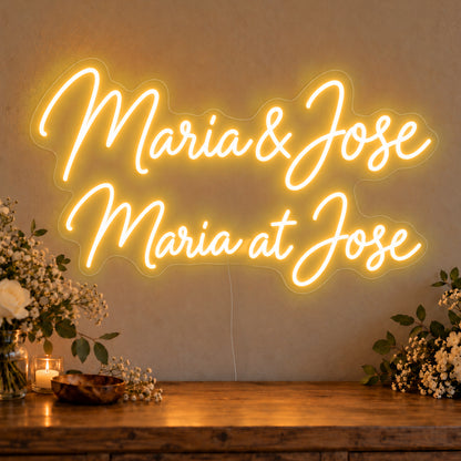 Personalised Bilingual Filipino Names Neon Sign in gold LED neon on clear acrylic, angled view