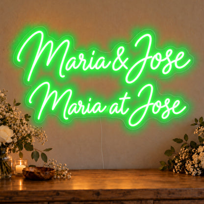Personalised Bilingual Filipino Names Neon Sign in green LED neon on clear acrylic, angled view