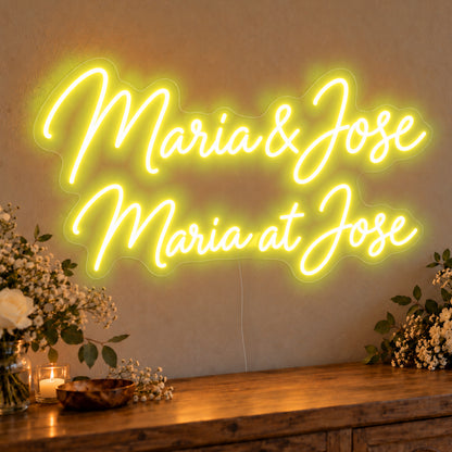 Personalised Bilingual Filipino Names Neon Sign in yellow LED neon on clear acrylic, angled view