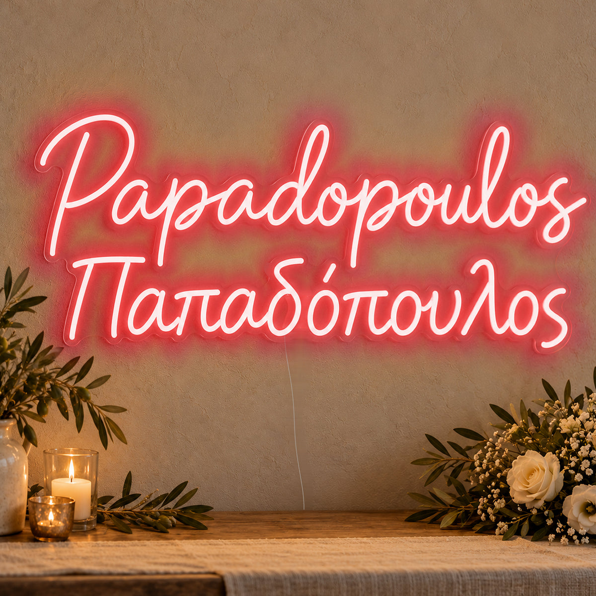 Personalised Bilingual Greek Surname Neon Sign in red LED neon on clear acrylic, angled view