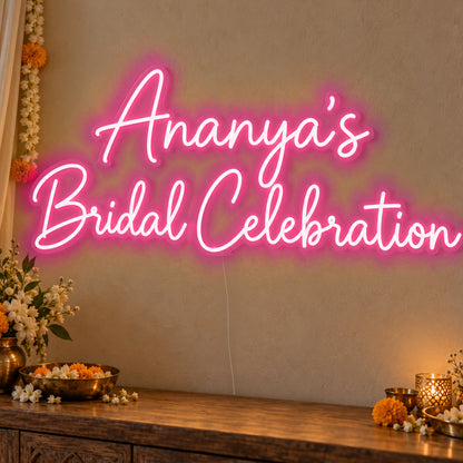 Personalised Bridal Celebration Neon Sign in rose red LED neon on clear acrylic, angled view