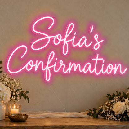 Personalised Confirmation Neon Sign in rose red LED neon on clear acrylic, angled view
