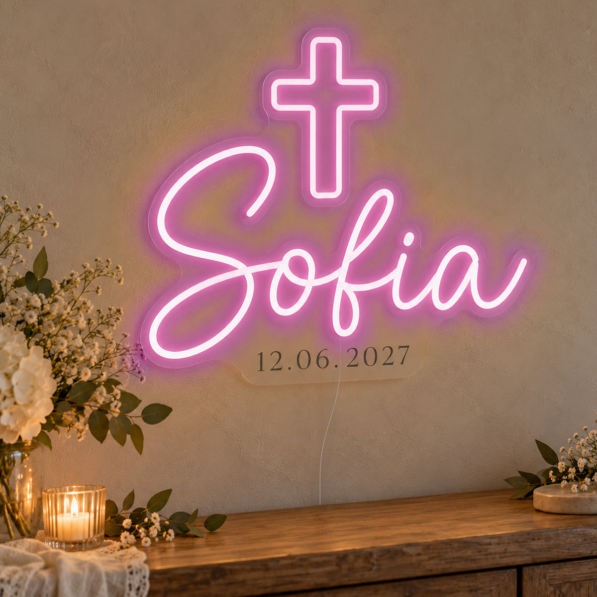 Personalised Cross Name Date Neon Sign in pink LED neon on clear acrylic, angled view
