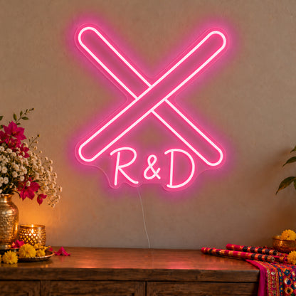 Personalised Dandiya Initials Neon Sign in rose red LED neon on clear acrylic, angled view