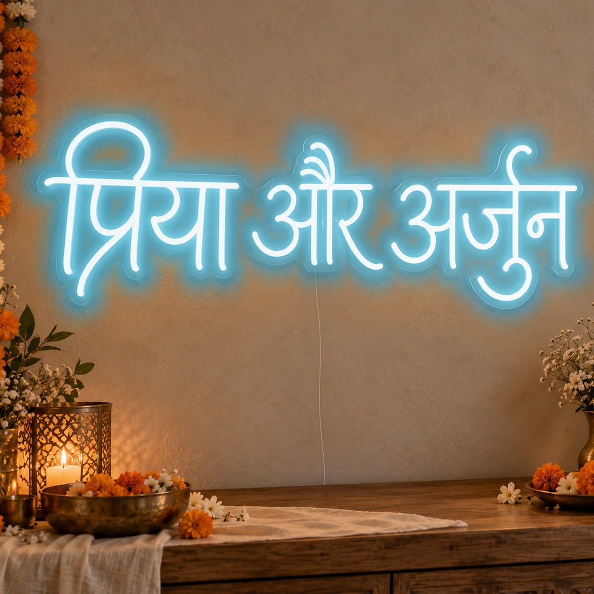 Personalised Devanagari Couple Names Neon Sign in ice blue LED neon on clear acrylic, angled view