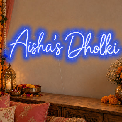 Personalised Dholki Neon Sign in blue LED neon on clear acrylic, angled view