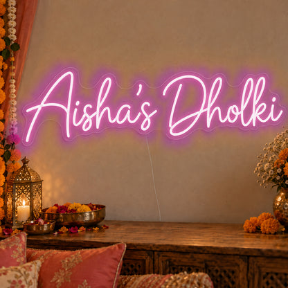 Personalised Dholki Neon Sign in pink LED neon on clear acrylic, angled view