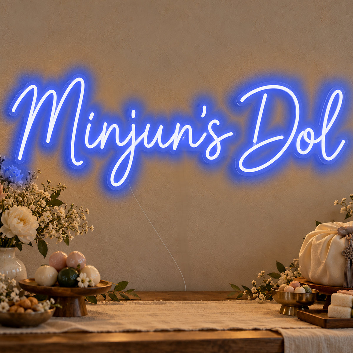 Personalised Dol Neon Sign in blue LED neon on clear acrylic, angled view