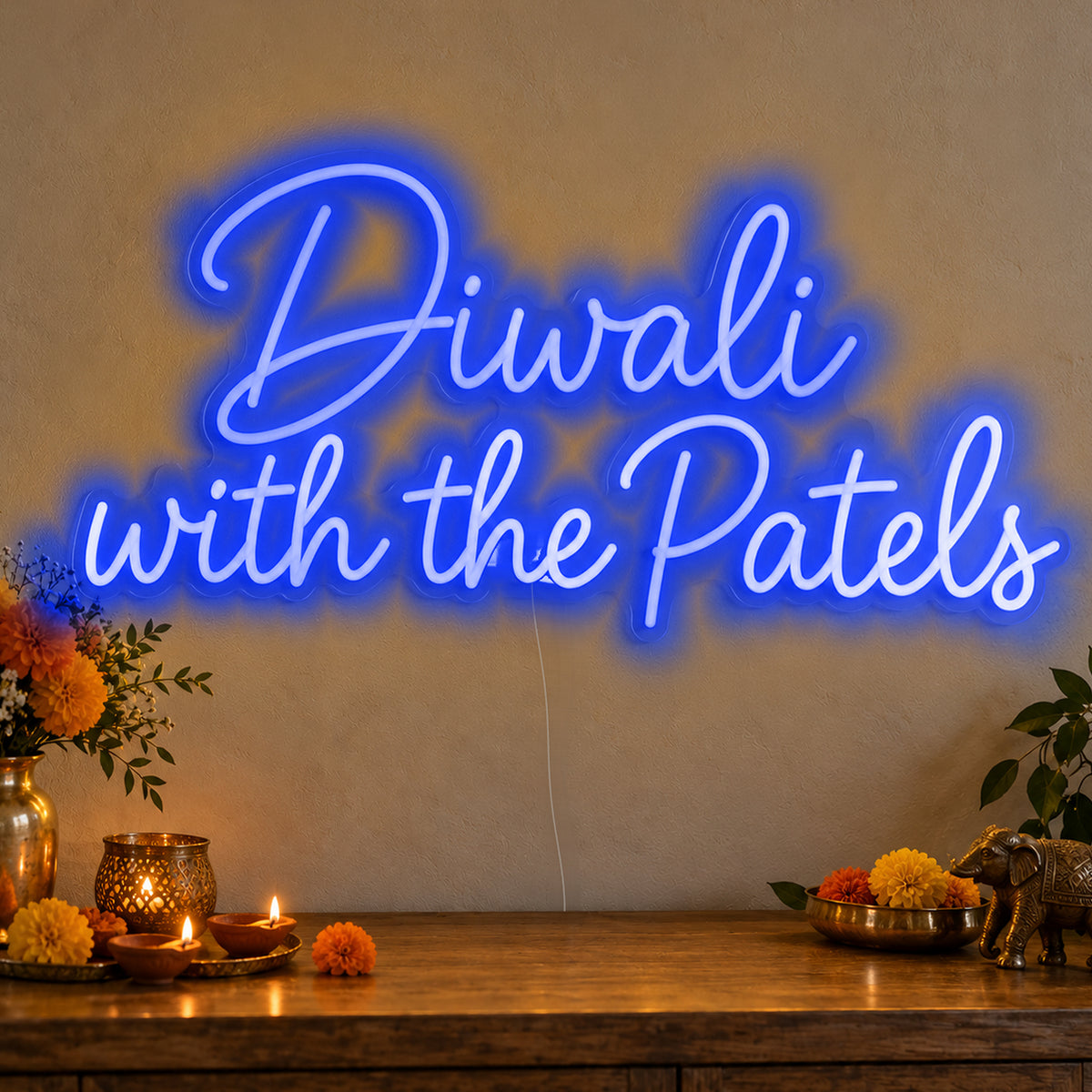 Personalised Family Diwali Neon Sign in blue LED neon on clear acrylic, angled view