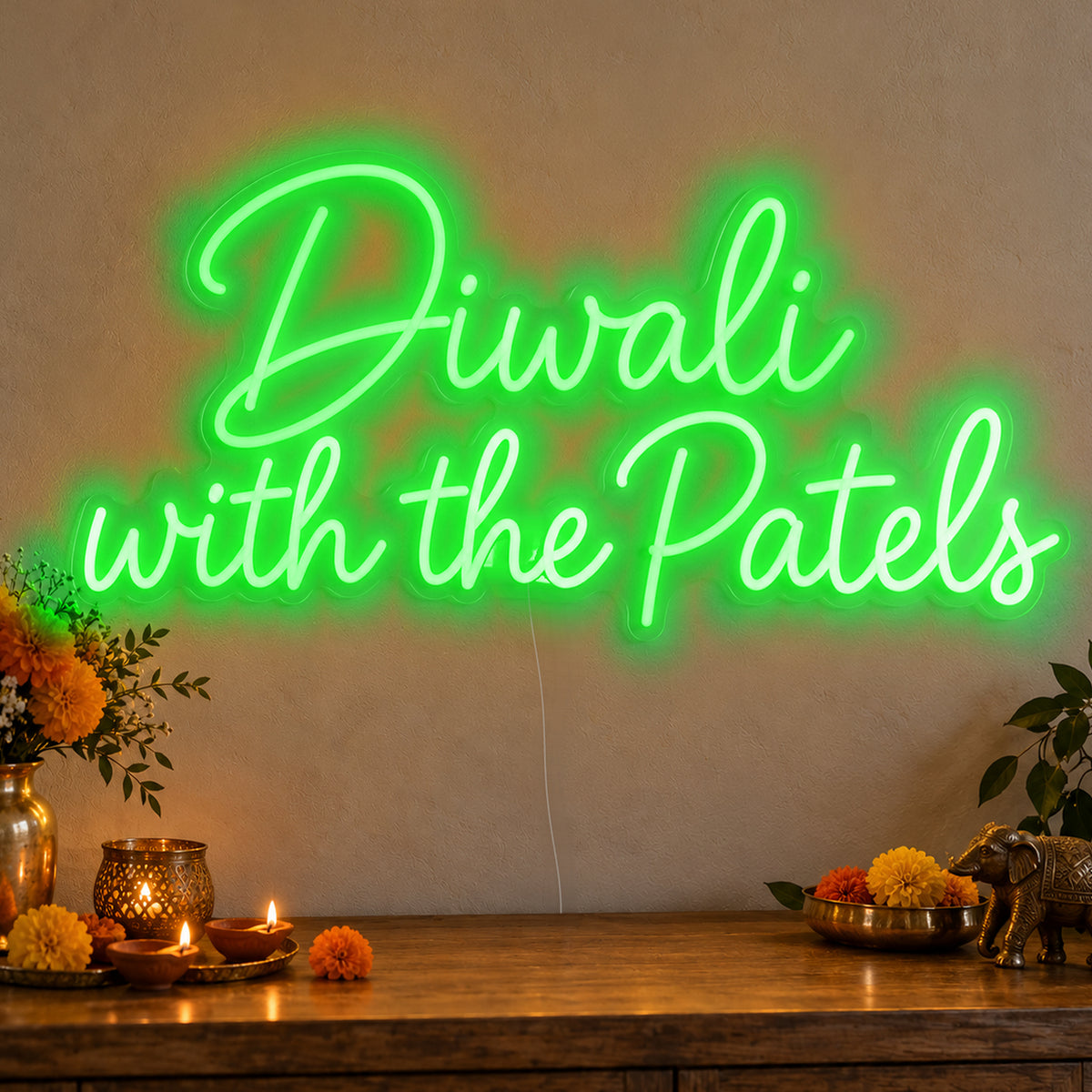 Personalised Family Diwali Neon Sign in green LED neon on clear acrylic, angled view