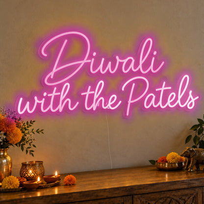 Personalised Family Diwali Neon Sign in pink LED neon on clear acrylic, angled view