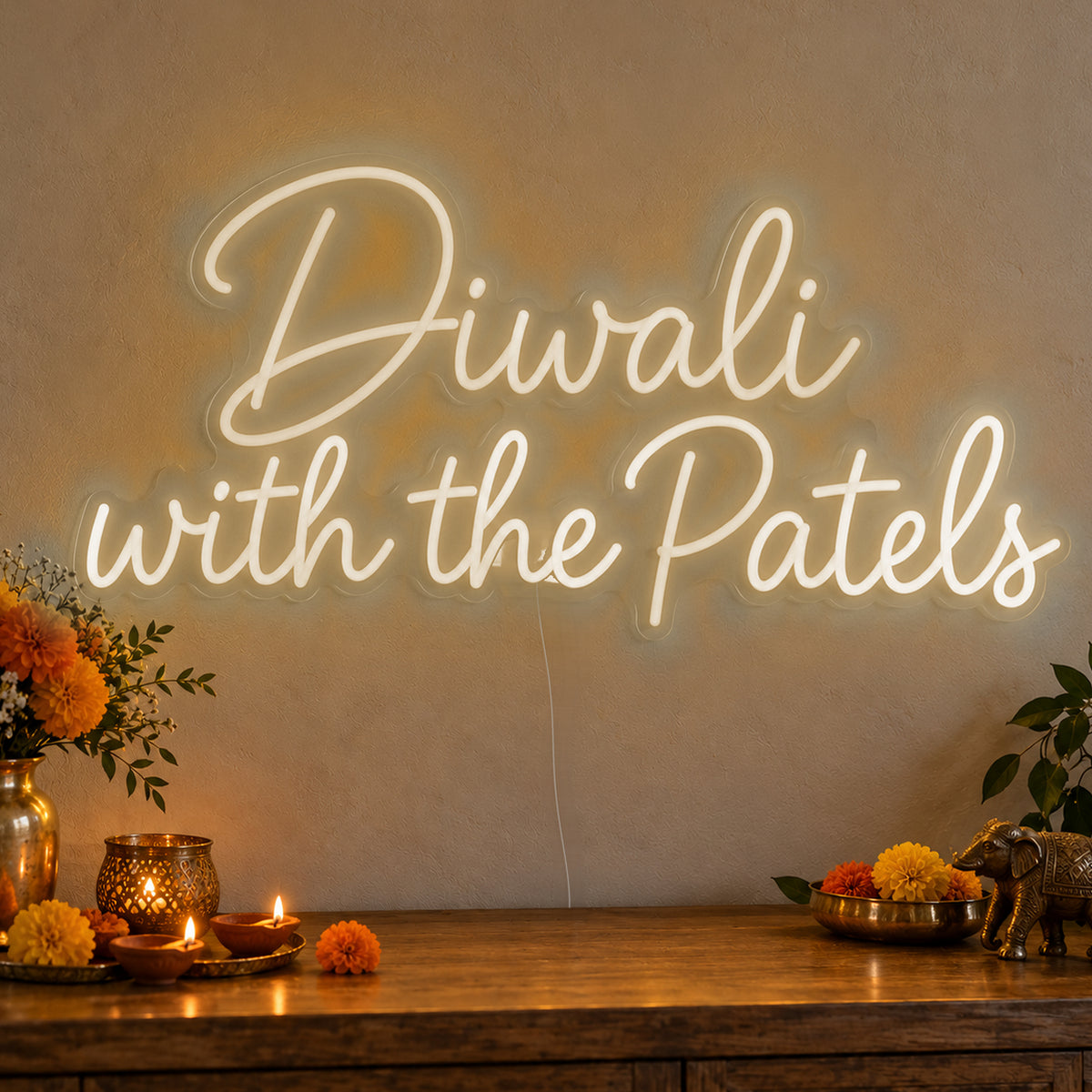Personalised Family Diwali Neon Sign in warm white LED neon on clear acrylic, angled view