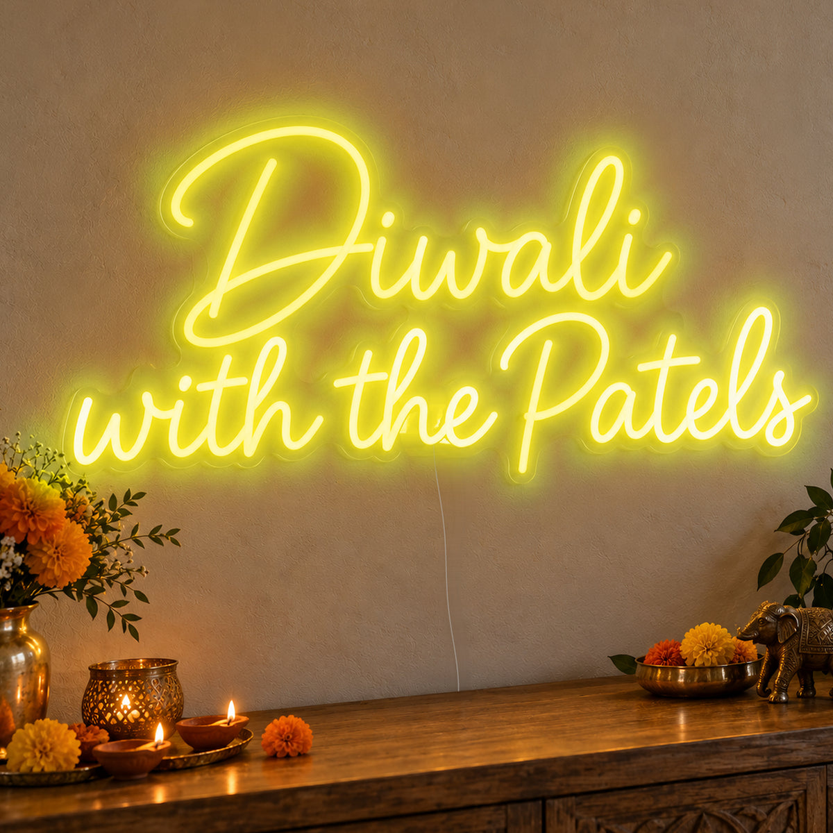 Personalised Family Diwali Neon Sign in yellow LED neon on clear acrylic, angled view