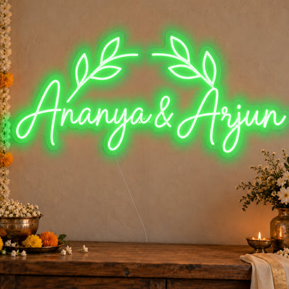 Personalised Floral Arch Names Neon Sign in green LED neon on clear acrylic, angled view